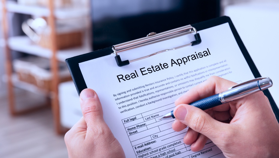 Close up Of A Mans Hand Filling Real Estate Appraisal Form At Home oceanside ca